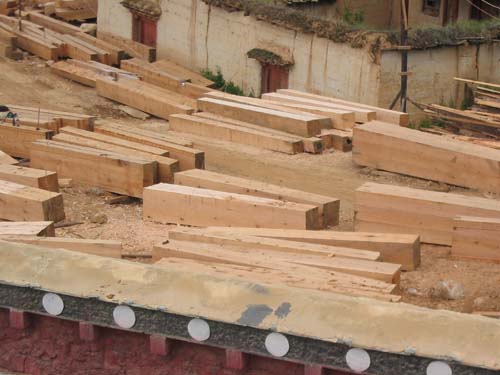 Massive timber pieces used in Tibetan architectural design