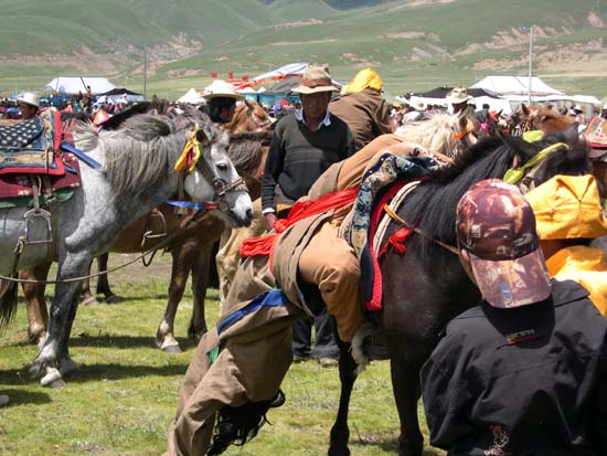 Tibetan horsemen at Lithang festival